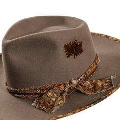 Introduce an air of sophistication with our Gypsy Felt Fedora Hat. Crafted from premium wool felt, this platinum fedora features a fabric bounded edge and an outback crown shape for a touch of artful flair. Elevate your style with this exclusive and elegant accessory. Artisan Short Brim Felt Hat For Fall, Luxury Brown Hat For Fall, Artisan Felt Hat With Short Brim For Fall, Artisan Fedora With Short Brim For Fall, Artisan Flat Brim Felt Hat For Fall, Luxury Brimmed Fedora For Fall, Western Wool Fedora For Kentucky Derby, Luxury Brimmed Hat For Fall, Luxury Brimmed Fall Hats