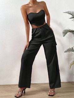 Exude effortless sophistication with our Solid Tube Top And Flap Pocket Side Cargo Pants. These pants are the perfect blend of style and functionality, featuring a solid colorway and flap pockets for extra storage. Whether you’re going for an edgy or classic look, these pants will cover you in all the right ways while the top will simply add to its elegance. Available in elegant black, striking orange, and a muted grey. Specifications: Pattern Type: Plain Details: Asymmetrical, Button, Pocket, T Trendy Denim, Casual Denim, Tube Top, Flap Pocket, Cargo Pants, Orange Black, Classic Looks, Orange Color, Black And Grey