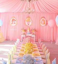 a table set up for a princess birthday party