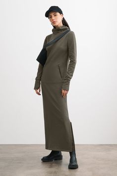 Lounge in luxury with our Allen Sweatshirt Dress. Handcrafted from midweight & breathable European French Terry, she features elevated athleisure details — maxi length, ribbed cuffs with thumbholes and a roomy patch pocket with double zip closures. Allen's straight-cut silhouette has a side slit for easy movement, while her oversized high neckline marries head-turning style with ultimate coziness.[SPLIT] Julia, in olive, is 5'10" (178 cm) tall, wearing size XS. Maritza, in black, is 5'9" (177 cm Elevated Athleisure, Sweatshirt Fabric, Sweatshirt Dress, High Neckline, Straight Cut, French Terry, Patch Pocket, Athleisure, Winter Outfits