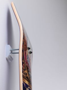 a skateboard mounted to the side of a wall