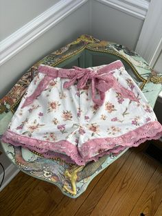 I love the white floral with the pink lace and I gave it a matching belt for you to configure to the style of your choice or simply go with out it. 

These are pre-owned, up-cycled shorts.  

Wash in cold and lay flat to dry, light iron on the lace.

Size US 8

Inseam 3"

Waist 28", High Waist

Top of belt to bottom lace is 13"

4 functional pockets Pink Lace Bottoms For Spring, Cute Lace Trim Bottoms For Spring, Spring Lace Bottoms With Floral Print, Spring Floral Print Lace Bottoms, Feminine Bottoms With Lace Trim For Vacation, Feminine Lace Trim Bottoms For Vacation, Cute Lace Bottoms For Spring, Casual Pink Lace Bottoms, Pink Bottoms With Lace Trim For Spring