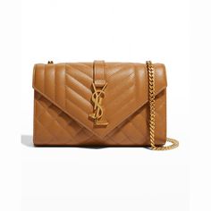 Saint Laurent shoulder bag in quilted powder-grain lambskin leather. Convertible shoulder strap that can be worn as a crossbody bag or doubled for a shoulder bag. Sliding leather/chain shoulder strap, 14.4" drop. Envelope top with metal YSL monogram; snap closure. Textile lining. Approx. 6.3"H x 9"W x 2.4"D. Designer Quilted Leather Wallet On Chain, Luxury Quilted Leather Wallet On Chain, Ysl Shoulder Bag, Leather Satchel Bag, Monogrammed Leather, Monogrammed Items, Leather Chain, Leather Satchel, Lambskin Leather