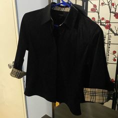 Burberry London Button Down Shirt Black Size L Brand New With The Plastic Still Attached But No Tag Measurements : Pit To Pit 17 Inches Sleeve When Not Rolled Up 17.5 Inches Length Shoulder To Bottom 22.5 Inches Shirt Has Some Stretch To It Composition 75%Cotton 20%Polyester 5% Spandex Designer Collared Tops For Business Casual, Designer Black Collared Blouse, Black Fall Blouse With Spread Collar, Black Spread Collar Blouse For Fall, Black Blouse With Spread Collar For Fall, Designer Fall Shirt For Office, Designer Long Sleeve Tops For Business Casual, Burberry Tops, Burberry Shirt