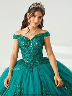 You'll love twirling around in this sequin embroidered long off the shoulder dress with A-line skirt by House of Wu 26002. Made out of tulle, this beautiful off shoulder ball gown features a sweetheart bodice adorned with sequin embroidery appliques, short sleeves, open back, and a floor length A-line skirt embellished with sequins embroidery applique and finishing edge. This look is finished with a lace-up corset back and a sweep train. Note: Cape is not included. Cape Style #30138. House of Wu Green Quinceanera Dresses, Quinceanera Collection, Off Shoulder Ball Gown, Long Mermaid Dress, Sheath Wedding Dress Lace, Tulle Balls, Quince Dress, Quinceanera Dress, Sequin Embroidery