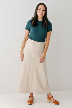 With the look of real denim but the feel of a quality knit, comfort is the key element in our exclusively designed Caroline skirt. The quick, pull-on style makes this skirt an effortless option for wherever your day might take you - running errands, making dinner, playing with the kids, or a quick trip to the coffee shop to grab your favorite latte. Exclusively designed by us with you in mind! Soft, comfortable knit denim fabric Light Khaki 65% Cotton 30% Polyester 5% Spandex All Other Colors 70 Modest Stretch Midi Skirt, Casual Long Skirt For Everyday Wear, Everyday Fall Lined Skirt, Casual Everyday Skirt With Elastic Waistband, Casual Skirt With Elastic Waistband For Everyday, Modest Bottoms For Day Out, Modest Relaxed Fit Bottoms For Spring, Casual Stretch Maxi Skirt For Fall, Everyday Flowy Midi Skirt