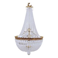 a crystal chandelier hanging from the ceiling with gold trimmings and beads