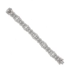 Slim vintage and Art Deco inspired diamond platinum bracelet. Adorned with white round cut diamonds in 6.18 carat total. Diamonds are all natural in G-H Color Clarity VS. Platinum 950 metal. Length: 17.2 cm Width. 1.2 cm Weight: 28.4 g [shortcode] [video] [/video] [/shortcode] Silver Diamond Bracelet With Pavé Setting, White Platinum Diamond Bracelet With Accents, White Platinum Diamond Jubilee Bracelet, White Platinum Jubilee Diamond Bracelet, Platinum Diamond Bracelet With Pave Setting In White Gold, Silver Diamond Bracelet In Fine Jewelry Style, Wedding Silver Platinum Tennis Bracelet, Wedding Platinum Silver Tennis Bracelet, Silver Platinum Tennis Bracelet For Wedding