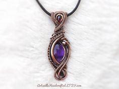 "Wire Wrapped Amethyst Pendant, Empath Protection Amethyst Necklace, Elven Jewelry, Protection Amulet Necklace, Healing Amethyst Gift for Her Unique Handmade Artisan Jewelry !! Original Designs by ArtsvilleHandcrafted If you love unique designs and Amethyst then...this beauty is perfect for you!! This piece has a gorgeous Amethyst, garnet and is created with Pure Copper Wires. IMPORTANT Select your choice of length for the necklace. All Jewelry is Gift Wrapped!! And dispatched within 1-2 working Purple Amulet Jewelry As A Gift, Purple Amulet Jewelry As Gift, Purple Amulet Style Jewelry Gift, Purple Amethyst Amulet Jewelry, Hand Forged Purple Pendant Necklace, Hand-forged Purple Pendant Necklace, Hand Forged Purple Necklace For Gift, Hand Forged Purple Amethyst Necklace, Hand Forged Purple Spiritual Jewelry