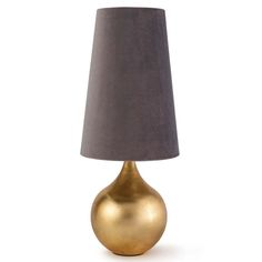 a gold lamp with a grey shade on it's base and a white background