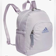 Product Details: Fabric Type 98% Polyester, 2% Spandex Care Instructions Hand Wash Only Origin Imported Country Of Origin Cambodia About This Item Multiple Pockets Give You Plenty Of Storage Space Adjustable Shoulder Straps, Wear At The Length That Works For You Premium Zippers Description Live And Breathe Sport. Bold Adidas Lettering And Traditional 3-Stripes Style Come Together In This Soft Mini Backpack. There's Just The Right Amount Of Room For An Essential Layer, And A Zip Pocket Secures Ke Adidas Gym Bag For Back To School, Purple Nylon Sporty Backpack, Sporty Purple Bag With Zipper Closure, Casual Purple Backpack For On-the-go, Rectangular Purple Backpack For On-the-go, Black Fanny Pack, Adidas Backpack, Adidas Bags, Purple Backpack With Zipper Closure For On-the-go