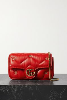 EXCLUSIVE AT NET-A-PORTER. Gucci's '2.0' bag is a playful addition to its signature 'Marmont' collection - this mini version is made from puffy red leather and embellished with gold-tone 'GG' hardware. Sized to hold just the essentials, it has a chain shoulder strap and slots for your cards inside. Shop Gucci, Braids With Shaved Sides, Gucci Purse, Gucci Marmont, Gucci Gg Marmont, Closet Organizer, Cute Winter Outfits, Gg Marmont, Roger Vivier