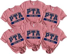 four pink tshirts with blue letters on the front and back, all tied together