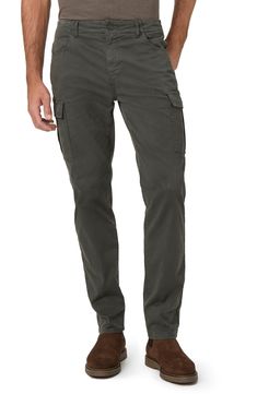 Cargo pockets add contemporary, utilitarian style to slim-cut, smart-casual tapered pants made from garment-dyed stretch sateen. 31 1/2" inseam; 14" leg opening; 10 1/2" front rise; 13 1/2" back rise (size 32) Zip fly with button closure Front scoop pockets; side flap-patch pockets; back welt pockets 98% cotton, 2% spandex Machine wash, tumble dry Imported Fitted Chino Cotton Twill Cargo Pants With Tapered Leg, Chino Cotton Twill Cargo Pants With Tapered Leg, Cargo Pants With Side Pockets, Tapered Utility Cargo Pants With Patch Pockets, Tapered Cargo Pants With Hip Pockets, Fitted Cargo Pants With Tapered Leg And Patch Pockets, Fitted Chino Cotton Twill Cargo Pants, Fitted Cargo Pants In Chino Cotton Twill, Fitted Cargo Pants With Pockets In Chino Cotton Twill