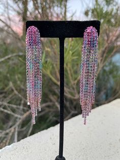 Pink rhinestone earrings Multicolor Long Drop Fringe Earrings, Pink Bling Earrings For Evening, Pink Rhinestone Drop Earrings, Pink Drop Earrings With Rhinestones, Trendy Dangle Crystal Earrings With Rhinestones, Pink Dangle Crystal Earrings For Evening, Pink Tassel Earrings For Pierced Ears For Party, Glamorous Multicolor Dangle Crystal Earrings, Pink Fringe Earrings For Party