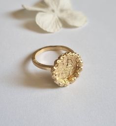 Gold coin ring, antique coin ring, old coin ring, antique ring, ancient coin ring, gold ring, ring size 4, coin ring, mothers day ring gift This coin ring is made of an antique gold coin I made a copy of which was decorated with golden hammered beads The ancient coin is attached to a gold band. This beautiful antique style ring is available both in nickel free, 14k gold plating over brass or silver base and in sterling silver. Dimensions: The coin diameter is about 0.5 an inches (1.25 cm) The antique ring is available in multiple sizes, starting at size 4. Choose your size on check out.  Other ring sizes are available upon request. Just convo me. This coin ring is just a perfect gift for mom for Mothers' day. For beautiful matching earrings, please follow the link below: https://www.etsy.c Ancient Style Yellow Gold Brass Jewelry, Antique Engraved Coin Signet Ring, Antique Coin Shaped Engraved Signet Ring, Antique Coin-shape Engraved Signet Ring, Antique Engraved Open Metal Ring, Ancient Style Gold Rings For Gifts, Hammered Signet Ring For Wedding, Vintage Engraved Coin Signet Ring, Ancient Style Yellow Gold Signet Ring Gift