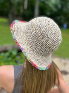 "Organic Hemp Crochet Sun Hat - Multi-Color, Rainbow Our 100% handmade crocheted sun hats are made from pure hemp yarn from Nepal. Perfect for summer...at the beach, pool, festival or just hanging around. They come in one size which fits most! As with many 100% hemp products they maybe slightly stiff, but soften and stretch over time. Features: - 100% Hemp hat and handmade in Nepal - It has wire in the rim means you can shape the hat however you desire and flat pack it for easy storage or travel Hand-knitted Crochet Hat For Beach, Beach Crochet Hat Hand Knitted, Hand Knitted Sun Hat For The Beach, Hand Knitted Beach Sun Hat Cap, Hand Knitted Beach Sun Hat, Crochet Bucket Hat For Beach Season, Multicolor Knitted Sun Hat For The Beach, Knitted Multicolor Hats For Vacation, Yarn Crochet Bucket Hat For Beach Season