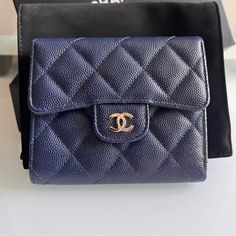 Chanel Trifold Compact Flap Wallet Caviar Navy Shw Made In Spain Excellent Used Brand New Condition In Mint (Pristine) No Flaws To Report Includes Everything: Dust Bag, Box And Authentication Card No Signs Of Wear And Tear. Length: 4.5 In Width: 0.5 In Height: 4 In Open For Offers But No Lowballing Please Happy Shopping Ladies!! Chanel Flap Wallet, Luxury Blue Wallet For Formal Occasions, Designer Blue Wallet For Formal Occasions, Designer Blue Wallets For Formal Occasion, Designer Blue Bifold Wallets, Elegant Blue Evening Wallets, Elegant Evening Blue Wallets, Elegant Blue Wallets, Luxury Bifold Evening Wallet