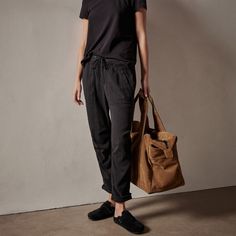 Our classic Soft Drape Utility Pant is made from an ultra soft cotton blend twill. This style has a contrast jersey waistband with drawcord, welt slash pockets and a single back pocket with button closure. For a casual and relaxed look, this style has front knee pleats and a rolled bottom cuff. Garment dyed with extra softeners for a soft lived in feel. Additional Information:• 65% Cotton, 33% Modal, 2% Elastane• Machine wash cold with like colors, tumble dry low Sporty Washed Black Sweatpants With Pockets, Cotton Utility Sweatpants With Patch Pockets, Utility Cotton Sweatpants With Patch Pockets, Casual Washed Black Pants, Casual Washed Black Sweatpants With Pockets, Casual Sweatpants With Pockets In Washed Black, Everyday Straight Leg Bottoms With Pockets, Casual Washed Black Pants With Elastic Waistband, Black Bottoms With Patch Pockets For Everyday