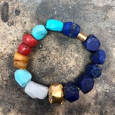 ANCIENT STONE BRACELET WITH 22K GOLD CLOSURE • DESIGNED AND HAND FORGED IN NEW YORK • STONES: LAPIS, TURQUOISE, CORAL, AND AMBER BEADS • LENGTH: 6.5 INCHES Please email info@elihalili.com or call the studio at 212-941-7979 for any inquiries. Luxury Yellow Gold Bracelets With Stones, Gold Beaded Gemstone Bracelets For Jewelry Making, Luxury Yellow Gold Bracelets With Natural Stones, Adjustable Gold Fusion Beaded Bracelets, Adjustable Gold Beaded Fusion Bracelets, Bohemian Gold Rondelle Bracelets, Gold Bohemian Rondelle Bracelets, Luxury Gold Beaded Gemstone Bracelets, Gold Fusion Bracelets With Round Beads