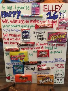 a sign with candy on it that says happy birthday