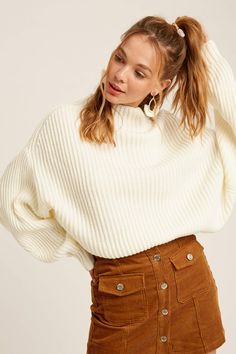 -Color: Cream -Ribbed textured -High neck -Long puff dolman sleeves -Drop shoulder -Ribbed on cuffs and hem -Imported -100% Acrylic -Model is 5' 9" 34-24-35 and wearing a size Small Dolman Sweater, Summer Of Love, Well Dressed, Dolman Sleeve, Drop Shoulder, Mock Neck, Knit Sweater, Knitted Sweaters, High Neck