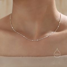 Minimalist Sparkle Disk Chain Choker Necklace in Sterling Silver, Available in Two Lengths, Silver or Gold, Skinny Necklace Dimensions: choose from the drop-down menu: 1.  40cm (16'') 2. 45cm (18'') These necklaces are made with sterling silver with the optional gold plating, they are hypoallergenic.   ------------------------------------------------------- Packaging: All our jewellery comes with our branded velvet bag so your item is ready to be gifted.  To read more about our production proces Boyfriend Necklace, Silver Necklace Simple, Casual Necklaces, Silver Choker Necklace, Silver Choker, Chain Choker Necklace, Velvet Bag, Chain Choker, Cute Jewelry