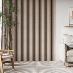 a living room with white furniture and striped wallpaper