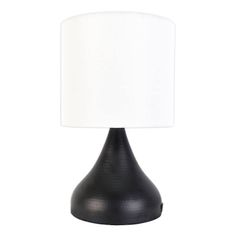 a black table lamp with a white shade on the top and bottom part of it