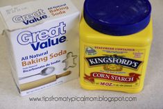 an assortment of food items including yogurt, bread and butter on a table