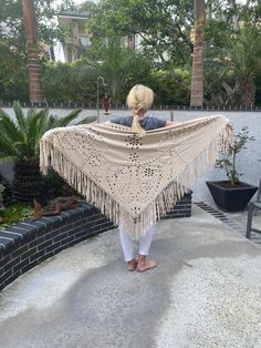 "Gorgeous Flowy Ultra suede shawl, shawl, wrap, Tan, Cream, fringed, Piano scarf, Extra long fringe, Cut out Shawl Beautiful large light creamy tan cut out shawl, dancing shawl with long fringe 36\" top to bottom additional 8\" fringe 74\" end to end NKBXLR Gorgeous Flowy Ultra suede shawl, shawl, wrap, Tan, Cream, fringed, Piano scarf, Extra long fringe, Cut out Shawl" Bohemian Fringe Scarves One Size, One Size Bohemian Scarves With Fringe, Bohemian Scarves With Fringe, One Size, Bohemian Cream Shawl With Fringe, Bohemian Beige Shawl With Fringe, Beige Bohemian Shawl With Fringe, Bohemian Shawl Cape With Fringe, Bohemian Fringe Shawl For Festivals, Festival Fringe Scarves One Size