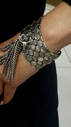 "♦ Flat and hard link bracelet made of iron in silver oxide plating, the bracelet is decorated with chains and bull charm and is inspired by rock style SIZE Length: 6.3\"(16cm) up to 7.9\"(20cm) Bracelet width: 1.37\"(3.5cm) bull width:0.59\"(1.5cm) ♦ This piece of jewelry is perfect as a gift for yourself, for a wedding day, Valentine's day or a birthday. so ♦ The jewel will be sent by registered mail (to some countries also includes a tracking number), more information in the F&Q. ♦ My Ets Thick Fringe, Bracelet Thick, Fringe Bracelet, Interesting Fashion, Layered Coin Necklace, Linked Bracelet, Silver Link Necklace, Silver Coin Necklace, Goth Style