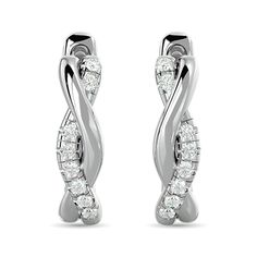 This pair of Twisted Hoop earrings is a brilliant embodiment of a puristic style with a twist. Each earring consists of two elegantly curving lines intertwined with each other, one sparkling with the bright brilliance of gleaming 10k White Gold 0.20 ct. tw. of diamonds, Clarity: I2-I3, Color G-H. This Infinity Fancy Hoops is set in micro-prong setting. Combining timeless appeal with a modern touch, these earrings are a great choice to embellish your everyday outfit!   PRODUCT INFORMATION Metal Content: 10K Metal Color: White Gold  Style: Infinity Hoops STONE INFORMATIONStone Type: DiamondNumber of Stones: 16Shape: RoundColor: G - HClarity: I2 - I3Carat Weight: 0.20 CTWSetting: Micro-prong Infinity Hoop, Hoop Earrings Diamond, Twisted Hoop Earrings, Gift Box Packaging, Earrings Diamond, Earring Crafts, Hip Hop Jewelry, Diamond Hoop Earrings, Everyday Outfit