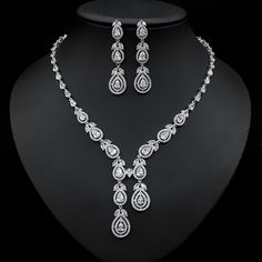 If you’re looking for a fine jewelry which looks sepecial,   precious stone please  consider cubic zirconia in bridal necklace which suitble for wedding jewelry set/Party Jewelry Fine Cubic Zirconia Jewelry Sets For Wedding, Dazzling Cubic Zirconia Jewelry Set With Elegant Design, White Cubic Zirconia Dangle Jewelry Set, Hand Set Teardrop Cubic Zirconia Jewelry Sets, Teardrop Cubic Zirconia Hand Set Jewelry Sets, Hand-set Teardrop Cubic Zirconia Jewelry Sets, American Diamond Jewelry Set With Matching Earrings For Wedding, Elegant Crystal Jewelry Sets For Anniversary, White Cubic Zirconia Bridal Necklace With Matching Earrings