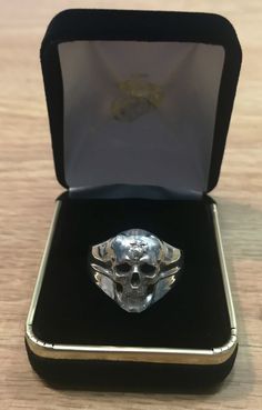 "Amazing Marine Corps Skull Ring with EGA located on the forehead of the skull. Available in sterling silver, 10k or 14k gold *Every ring we design and handcraft is made by a Marine Corps Veteran at our shop in Lakewood, Colorado - Proudly Made in USA. *Amazing Custom Marine Corps Ring made by a USMC Veteran. Officially licensed and approved by the US Marine Corps! *MADE BY A MARINE FOR MARINES! (TM) *These USMC Rings are Solid, bold, powerful and of substantial weight! Durable and Marine Tough! Sterling Silver Skull Ring In White Gold, Sterling Silver Skull Ring With Engraving, Collectible Sterling Silver Skull Ring With Polished Finish, Sterling Silver Skull Ring Engraved, Sterling Silver Engraved Skull Ring, Gift White Gold Hallmarked Skull Ring, Collectible Sterling Silver Skull Ring, Sterling Silver Skull Ring Collectible, Hand Cast Sterling Silver Skull Ring