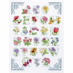 cross stitch alphabet with flowers on it