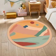 a bedroom with a round rug on the floor and a teddy bear next to it