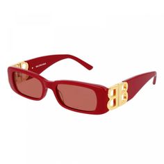 Introducing the Balenciaga BB0096S 003 Red/Red sunglasses, a stunning addition to the Balenciaga eyewear collection. These chic and sophisticated frames have a striking red acetate frame that exudes luxury and glamour. The red lenses perfectly complement the frame, creating a bold and eye-catching look that is sure to turn heads. Designed for women who appreciate high-quality craftsmanship and timeless style, these sunglasses feature a sleek rectangle shape that is both modern and classic. The frame material is acetate, known for its durability and comfort, making these sunglasses both fashionable and practical for everyday wear. With a lens socket width of 51 and a temple length of 130, these sunglasses are designed to provide a comfortable fit for all-day wear. The bridge size of 18 ensu Red Rimmed Sunglasses, Designer Red Tinted Sunglasses, Luxury Red Polarized Sunglasses, Luxury Red Sunglasses With Gradient Lenses, Luxury Red Tinted Sunglasses, Luxury Red Square Frame Sunglasses, Elegant Red Polarized Sunglasses, Chic Red Sunglasses With Uv Protection, Trendy Red Sunglasses For Evening