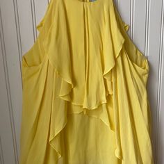 100 Percent Silk. Not Polyester. Feminine And Silk, Flowing Spaghetti Strap Blouse. It Is The Bright Yellow In The First Photo- Never Worn Summer Sleeveless Party Blouse, Flowy Sleeveless Party Blouse, Flowy Sleeveless Blouse For Party, Chic Yellow Spaghetti Strap Top, Yellow Cami Top For Party, Yellow Sleeveless Blouse With Ruffles, Sleeveless Yellow Blouse With Ruffles, Spaghetti Strap Blouse, Strap Blouse