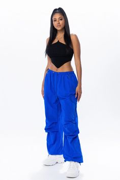 Royal blue cargo pants with an elastic waistband and adjustable ankles. Return Policy WE ONLY OFFER STORE CREDIT FOR RETURNS! Feel free to email us at info@shopluxxeapparel.com or DM us with any questions regarding fit, styling, or our return policy in general. To read more into our return policy please click here. Blue Stretch Pants With Cargo Pockets, Stretch Blue Pants With Cargo Pockets, Blue Stretch Straight Leg Cargo Jeans, Blue Straight Leg Parachute Pants In Cargo Style, Blue Straight Leg Cargo Parachute Pants, Blue Stretch Wide Leg Cargo Pants, Blue Cargo Style Straight Leg Parachute Pants, Blue Cargo Style Parachute Pants With Straight Leg, Blue Cargo Parachute Pants For Streetwear