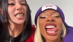 two women with their mouths open and one has her tongue out to the other side