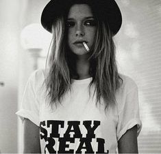 "Stay Real T-shirt Cool Casual Tumblr Grunge Tee AVAILABLE SIZES: S,M,L,XL,2XL,3XL COLOR: WHITE, BLACK, HEATHER GREY CONDITION: BRAND NEW T-SHIRT SPECS : 100% high quality pre-shrunk cotton (165 g/m2) jersey). Taped neck and shoulders, twin needle stitching, seamless collar. PRINT: Highest quality print - not cheap \"iron-on\" transfers! MEASUREMENTS : width - armpit to armpit ; length - the body length is measured in a straight line from the highest point of the shoulder at the join of the coll Grunge Tee, Stay Real, Grunge Style, White Tee, Black Print, Shirt Design, Celebrity Style, Fashion Photography, Graphic Tees