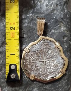 This piece has a beautiful and bold look to it, a large odd shape that gives this coin a lot of character. The coin itself is made from the silver bars recovered from the Atocha and comes with a certificate stating that. I use moulds from the original coins to get the print. This is a replica but actually made from the silver from the Atocha. The frame around is SOLID 14KT GOLD. a large, heavy and beautiful piece of history. Key West Fl, Coin Set, Weird Shapes, Silver Coin, Silver Bars, Gold Gilding, Silver Coins, Gold Set, Key West