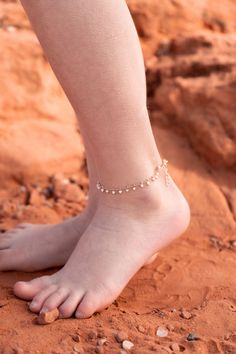 "This dainty anklet is the perfect addition to any outfit and is darling during the summertime! These anklets are perfect by themselves or stacked with others. The chain is out of 14k gold filled material. It is hypoallergenic along with water and tarnish resistant. As with any type of jewelry, it is best practice to avoid any harsh chemicals, lotions, oils, sunscreens, etc. to make sure your jewelry stays in the best quality possible. For best fit, please measure before ordering using a string to ensure you purchase the right size. Each anklet comes with a 1 inch extender chain. Average sizing goes as follows: 0-6 Months: 5\" 6-12 Months: 5.5\" 1-3 Years: 6\" 3-6 Years: 6.5\" 6-12 Years: 7\" Adult XS: 7.5\" Adult S: 8\" Adult M 9\" Adult L: 10\" Adult XL: 11\" If you have any questions, p Toddler Jewelry, Dainty Anklet, Baby Jewelry, Beaded Anklets, Best Practice, Anklet Bracelet, Chain Anklet, Cute Bracelets, Anklet Jewelry