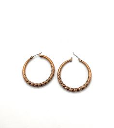 Gorgeous collectible copper round earring by Lia Sophia. Vintage Brass Hypoallergenic Earrings, Bronze Metal Hoop Earrings, Vintage Hypoallergenic Brass Earrings, Bronze Hoop Pierced Earrings, Hypoallergenic Vintage Brass Earrings, Bronze Single Earring Made Of Copper, Nickel-free Rose Gold Circle Earrings, Electroformed Metal Hoop Earrings, Nickel Free Rose Gold Circle Earrings