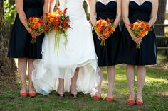 the bride and her four bridesmaids pose for a photo