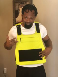 a man wearing a yellow safety vest