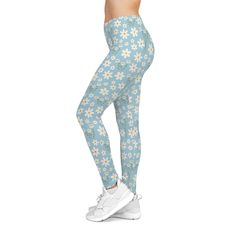 Experience the ultimate in comfort and style with our Sky Blue Daisy Women's Casual Leggings. Made with a light blue fabric, these leggings feature a delicate daisy design that is both pretty and sweet. Stay calm and in control during your workouts, while looking adorable and cute. Bring a touch of nature to the gym with our floral white flower print. Perfect for morning yoga or any exercise attire, these leggings are a must-have for any spring or summer wardrobe. The most comfortable item in your clothing shop, these casual leggings are so smooth no one will ever want to step out of them. They're made from 83% polyester, 17% spandex and sport a silky finish. Perfect for chilling in the house and working out – the elastic waistband keeps them in place at all times. A size and care label is Stretch Light Blue Leggings For Spring, Casual Full-length Spring Leggings, Trendy Full Length Leggings For Spring, Fitted Light Blue Casual Leggings, Light Blue Floral Print Bottoms For Spring, Casual Daisy Print Bottoms For Spring, Casual Spring Bottoms With Daisy Print, Blue Fitted Cotton Leggings, Fitted Blue Cotton Leggings