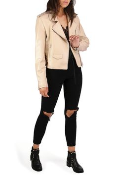 Amp up any outfit with this trendy cropped moto jacket constructed from sheepskin leather with adjustable side buckles and multiple pockets. 18 1/2" length (size Small) Asymmetric zip closure Notched lapels Front zip pockets; flap coin pocket Lined Leather Professional leather clean Imported Fall Biker Cropped Jacket With Zipper Closure, Spring Biker Cropped Jacket With Zipper Closure, Trendy Leather Biker Jacket With Zipper, Spring Leather Biker Cropped Jacket, Spring Biker Cropped Leather Jacket, Spring Biker Leather Jacket With Asymmetrical Zip, Spring Biker Jacket With Side Zipper, Spring Leather Jacket With Asymmetrical Zip, Edgy Leather Cropped Jacket For Spring