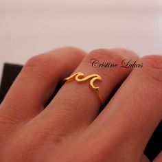 "This simple and cute water lover's ring features two small waves symbolizing sailing, adventure, beach, surfing, etc. Ring is associated with Costa Rica Pura Vida. In English it has many different interpretations like \"pure life\", \"take it easy\", \"enjoy life\", \"all good\", \"purity in life\", \"hello\", \"goodbye\", \"this is life!\" Ring can be worn separately or stacked with other rings. Amazing young look for daily casual wear. Metal options: Sterling Silver Sterling Silver with Yello Adjustable Wavy Rings As A Gift, Waves Ring, Costa Rica Pura Vida, Ocean Tides, Pure Life, Hello Goodbye, Large Waves, Life Ring, Beach Surfing